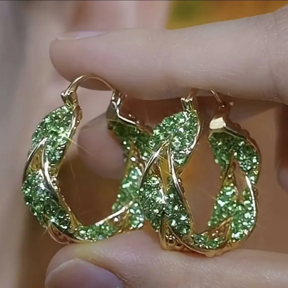 Twisted hoop earrings, green gemstone,